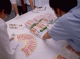 3 Chinese held over fake beer coupons from China